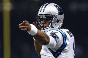 Carolina Panthers quarterback Cam Newton (1) reacts in the first half of an NFL football game against the New Orleans Saints in New Orleans, Sunday, Dec. 6, 2015. (AP Photo/Jonathan Bachman)