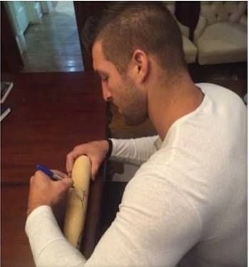 Tebow signs bat