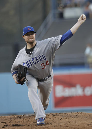 Chicago Cubs starting pitcher Jon Lester throws during the first inning of Game 5 of the National League baseball championship series against the Los Angeles Dodgers Thursday, Oct. 20, 2016, in Los Angeles. (AP Photo/David J. Phillip)