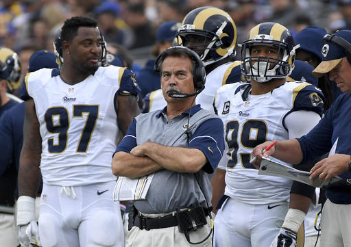 Los Angeles Rams head coach Jeff Fisher watches during the first half of an NFL football game against the Atlanta Falcons Sunday, Dec. 11, 2016, in Los Angeles. (AP Photo/Mark J. Terrill)