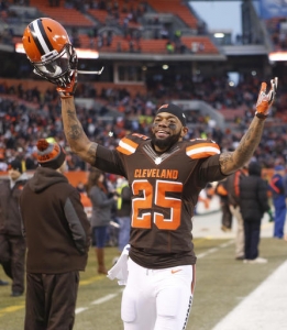 Cleveland Browns running back George Atkinson (25) celebrates after the Browns defeated the San Diego Chargers in an NFL football game, Saturday, Dec. 24, 2016, in Cleveland. (AP Photo/Ron Schwane)