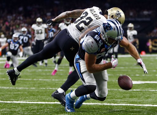 New Orleans Saints strong safety Kenny Vaccaro (32) breaks up a pass in the end zone intended for Carolina Panthers tight end Greg Olsen (88) in the second half of an NFL football game in New Orleans, Sunday, Oct. 16, 2016. Vaquero was called for pass interference which set up a Carolina touchdown. (AP Photo/Butch Dill)